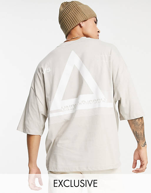 ASOS Unrvlld Spply oversized t-shirt with front logo in beige