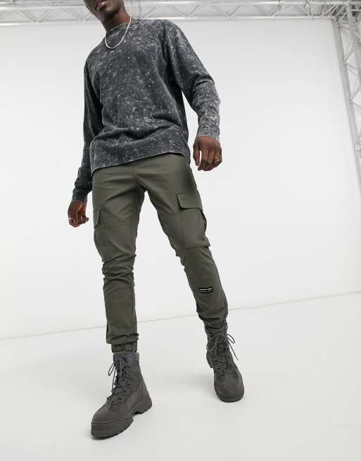 ASOS Unrvlld Spply - Pantaloni cargo affusolati kaki