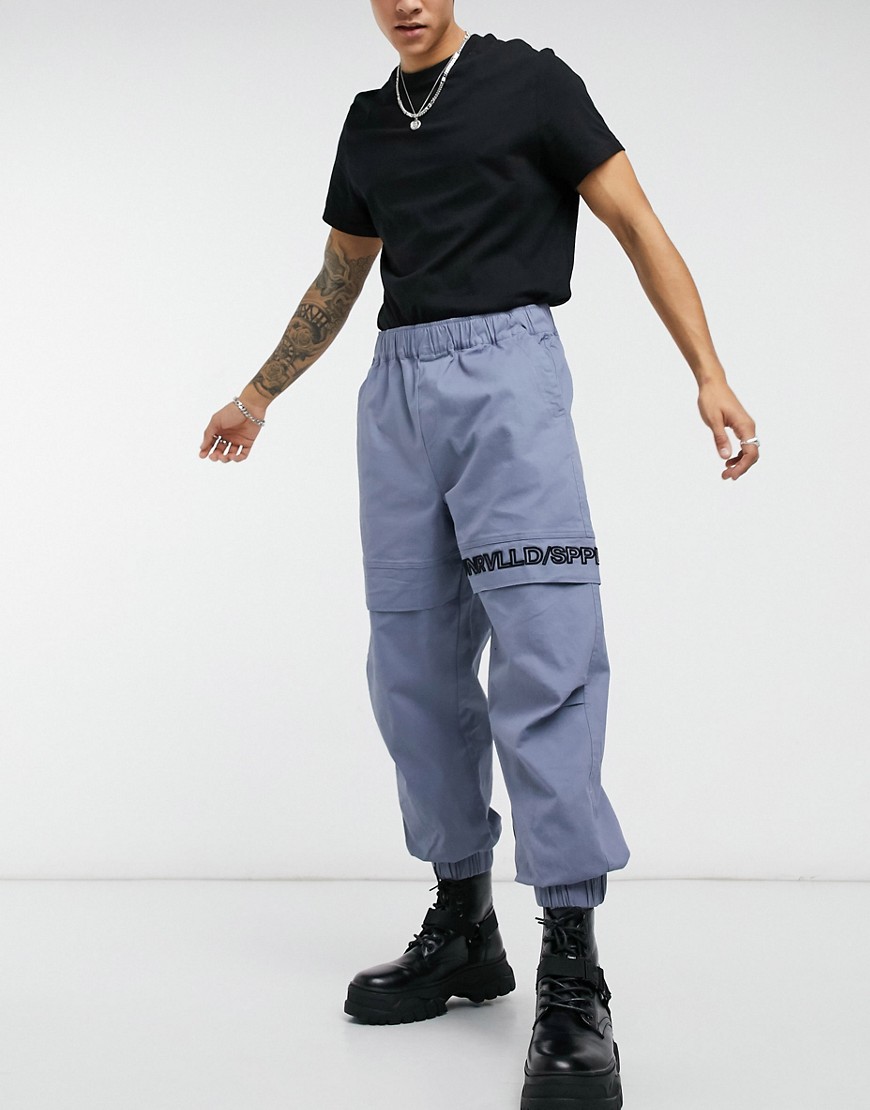 ASOS Unrvlld Spply pants in oversized tapered fit in blue-Blues