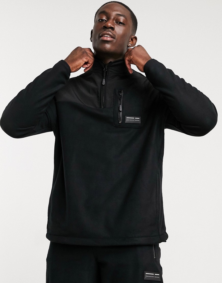 ASOS - Unrvlld Spply - Ruimvallend sweatshirt van fleece met korte rits, nylon inzetstukken en badge, deel van combi-set-Zwart