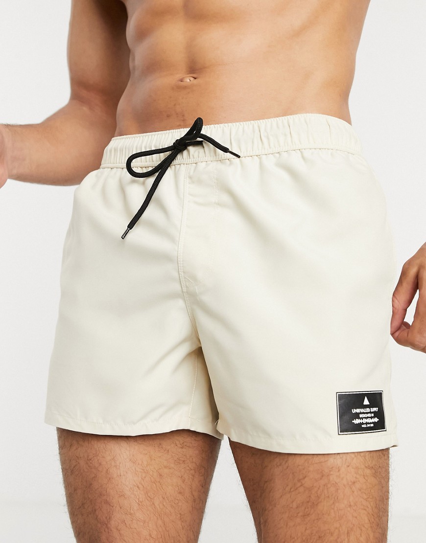 ASOS Unrvlld Spply swim shorts in beige short length-Neutral
