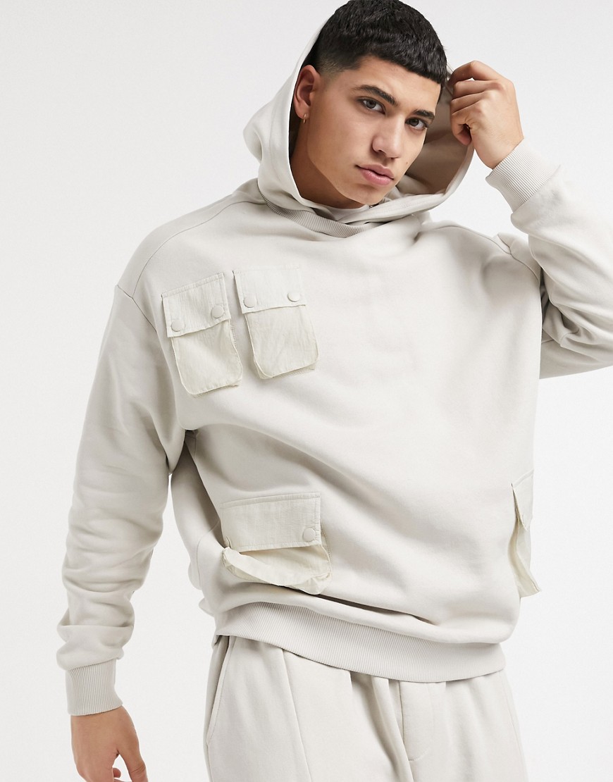 ASOS Unrvlld Supply co-ord oversized hoodie in beige with utility pockets-Neutral