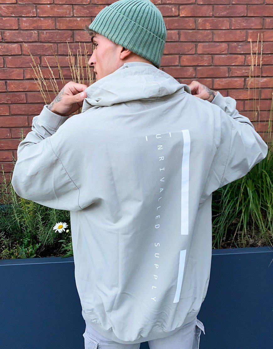 ASOS - Unrvlld Supply - Oversized lange hoodie van nylon met logo-Wit