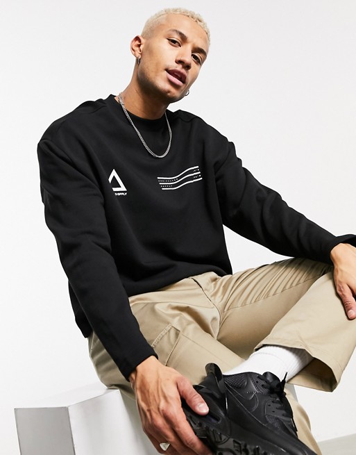 ASOS Unrvlld Supply oversized sweatshirt in black with chest logos