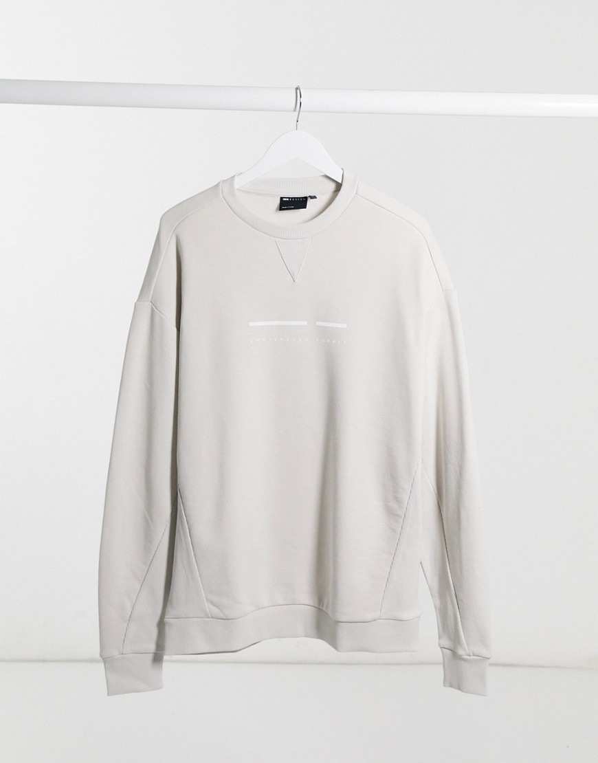 ASOS – Unrvlld Supply – Oversized sweatshirt med gummilogga-Grå