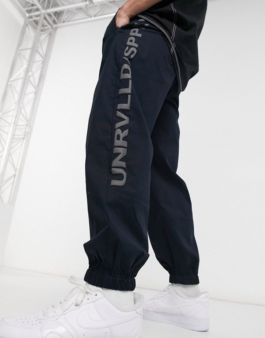 ASOS Unrvlld Supply oversized tapered sweatpants in blue-Navy