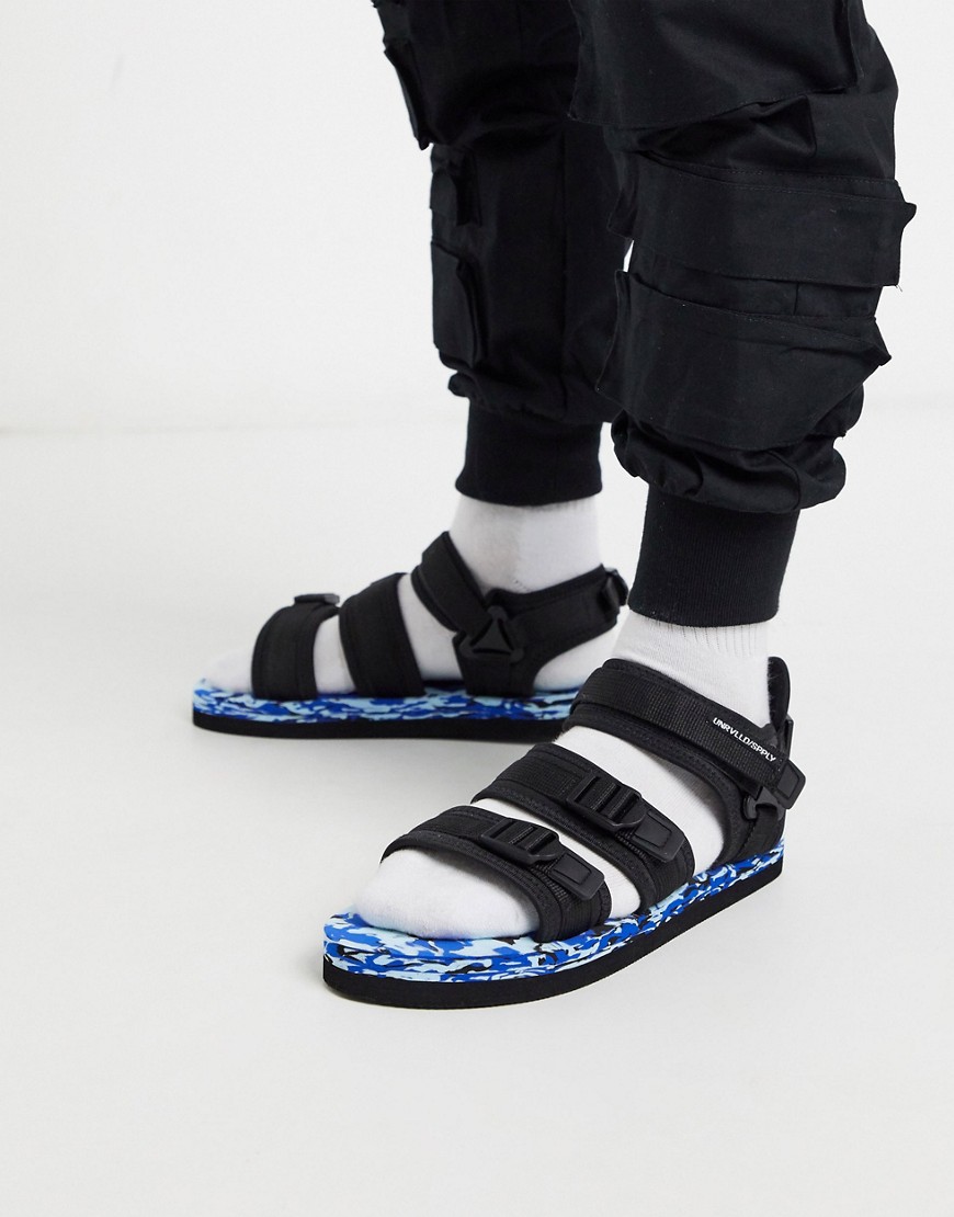 ASOS - Unrvlld Supply - Svarta tech-sandaler med färgglad sula