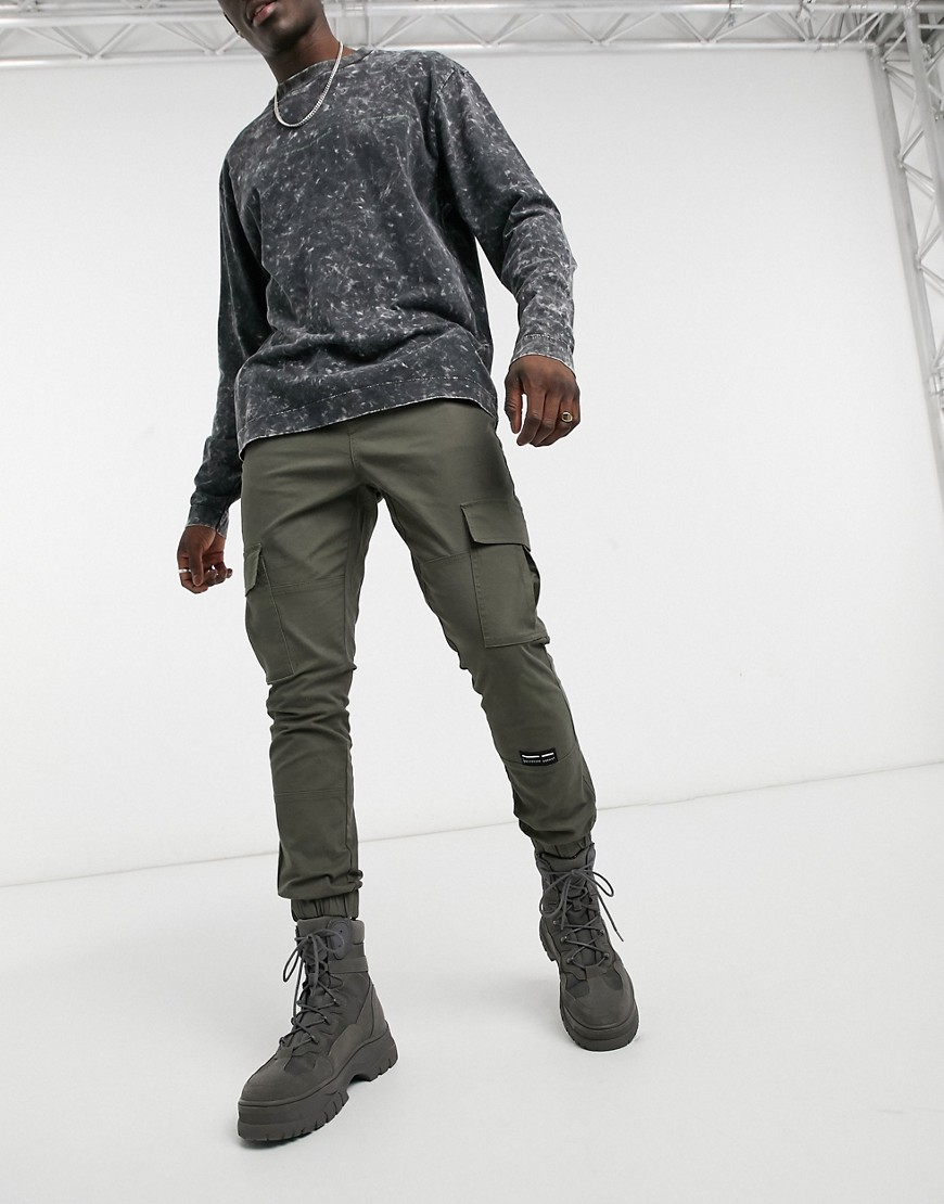 ASOS Unrvlld Supply tapered cargo trousers in khaki-Green