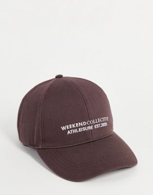ASOS Weekend Collective baseball cap with logo in brown