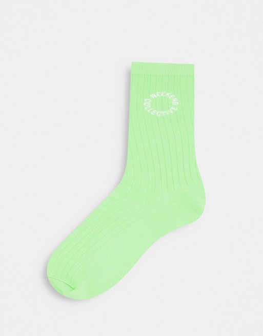 ASOS Weekend Collective calf length rib sock with embroidered logo in green