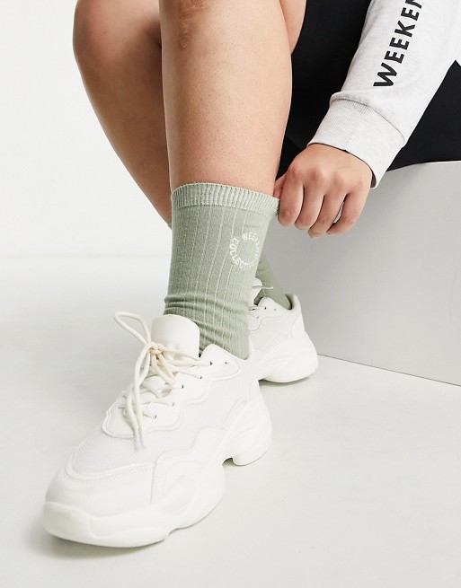 ASOS Weekend Collective calf length rib sock with embroidered logo in khaki