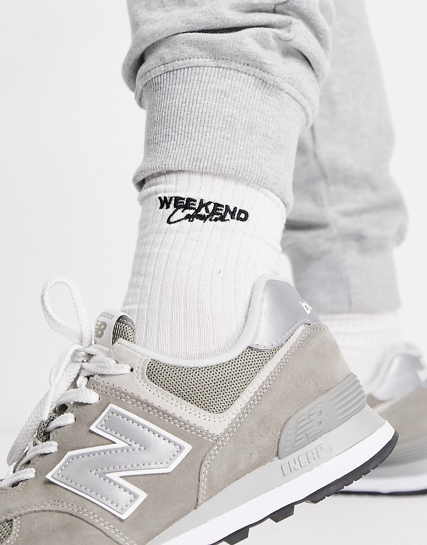 ASOS Weekend Collective calf length rib sock with embroidered logo in white