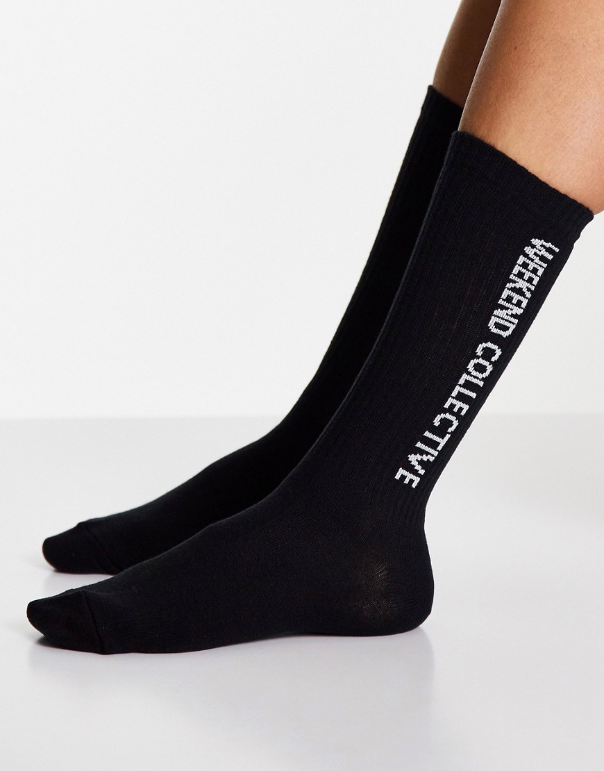 ASOS Weekend Collective calf length rib socks with horizontal logo in black