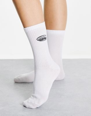ASOS Weekend Collective calf length socks with embroidered logo in white