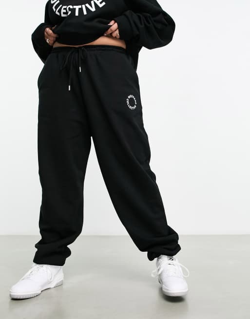 ASOS Weekend Collective oversized sweatpants with logo in black