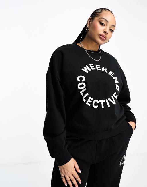 ASOS Weekend Collective oversized sweatshirt with woven logo in black