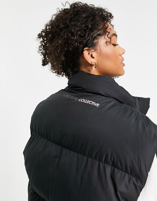 https://images.asos-media.com/products/asos-weekend-collective-curve-oversized-vest-in-black/23790581-3?$n_550w$&wid=550&fit=constrain