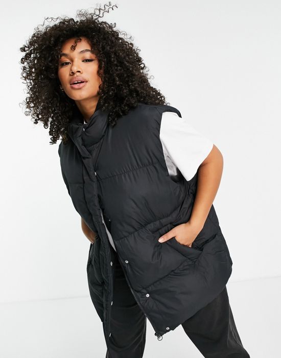 https://images.asos-media.com/products/asos-weekend-collective-curve-oversized-vest-in-black/23790581-4?$n_550w$&wid=550&fit=constrain