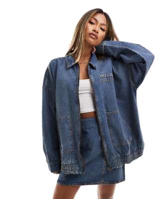 denim bomber jacket with logo in mid blue wash