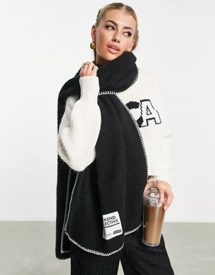 ASOS Weekend Collective fluffy scarf with blanket stitch and label in black | ASOS