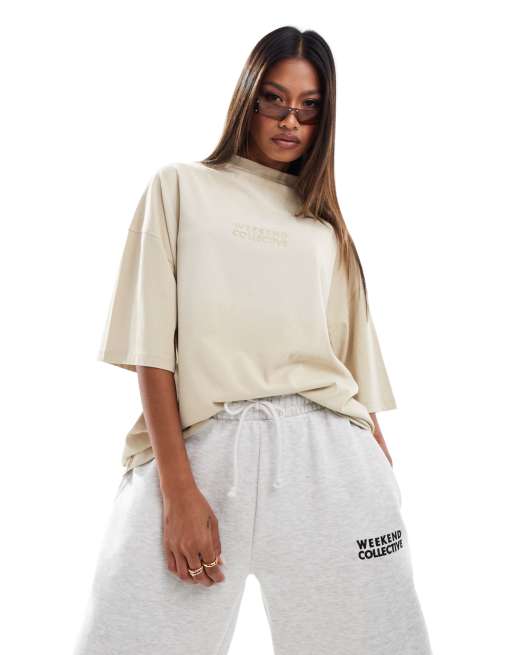 ASOS – Weekend Collective – Hochgeschlossenes T-Shirt in cremeweißer Acid-Waschung