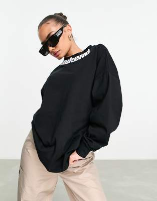 ASOS - Weekend Collective - Langärmliges Oversized-Shirt in Schwarz mit Logo am Kragen-Black