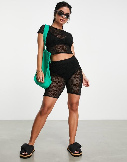 ASOS Weekend Collective legging shorts in flocked mesh graphic in