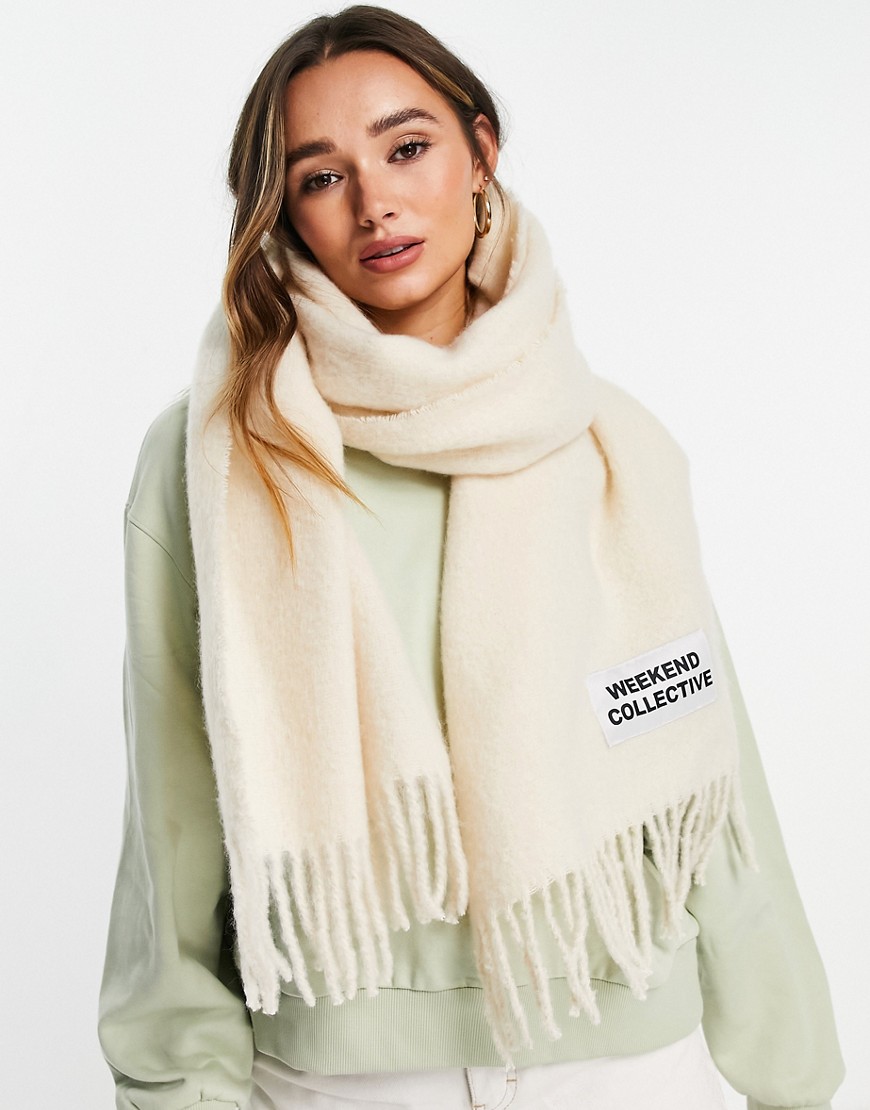 ASOS Weekend Collective long woven fluffy tassel scarf with logo in cream-White