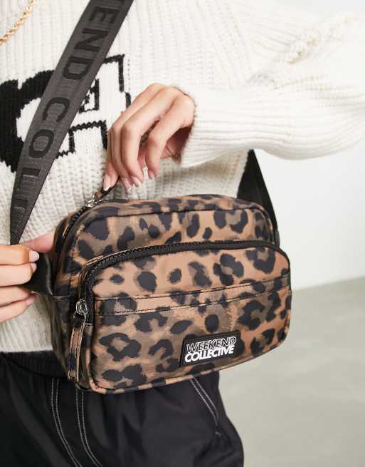 ASOS DESIGN padded nylon crossbody bag in tiger print