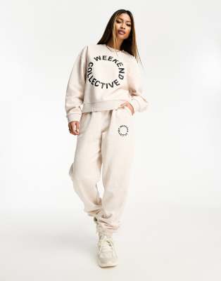 ASOS Weekend Collective - Oversize-Jogginghose in meliertem Hellbeige mit schwarzem Logo, Kombiteil-Neutral