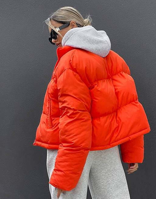 sympathy equal Alice ASOS Weekend Collective oversized puffer jacket in orange | ASOS