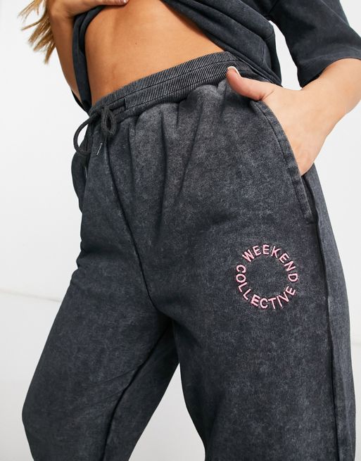 ASOS Weekend Collective oversized sweatpants with logo in black