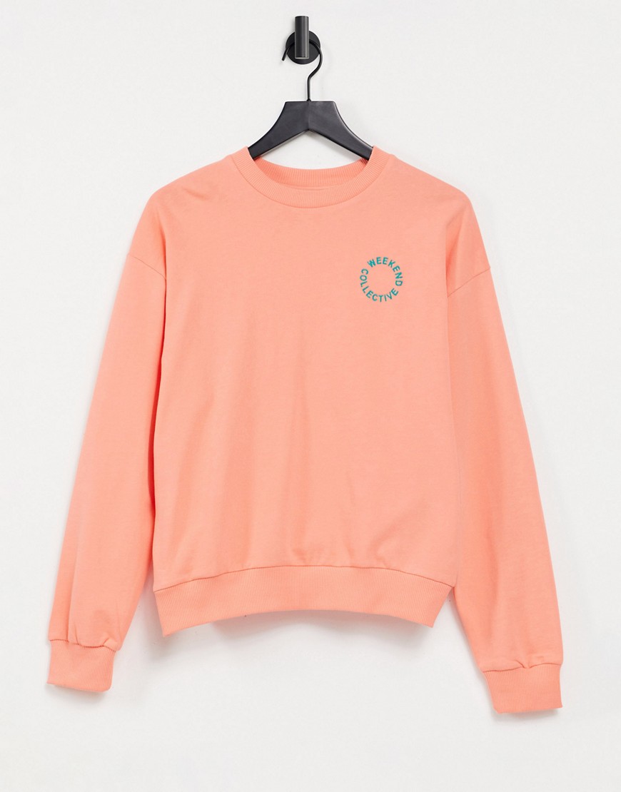 ASOS Weekend Collective oversized sweatshirt with tonal embroidery logo in coral-Multi