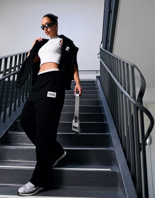 ASOS Weekend Collective oversized trackies with woven logo in black