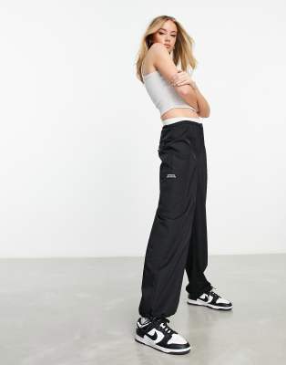 parachute cargo pants with pocket in black