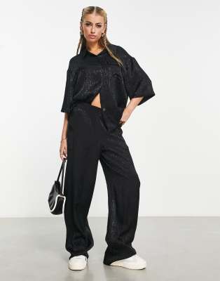 ASOS Weekend Collective satin wide leg trouser in black monogram  - ASOS Price Checker