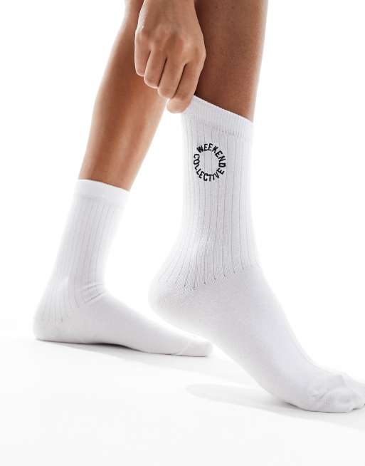 ASOS Weekend Collective calf length socks with embroidered logo in white