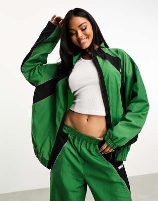 ASOS - Weekend Collective - Sportliche Trainingsjacke aus grünem Nylon mit Oversize-Passform