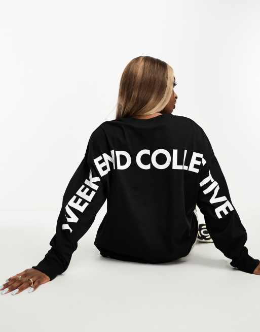 ASOS Weekend Collective – Svart t-shirt i oversize med lång ärm och vit logga