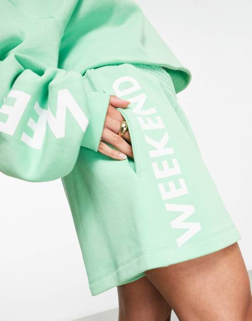 ASOS Weekend Collective sweat shorts with side graphic in appler green, 3 of 4