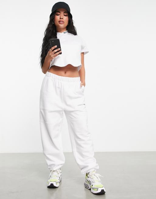 ASOS Weekend Collective sweatpants with combat pockets in white