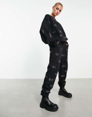 sweatpants with hotfix monogram in black