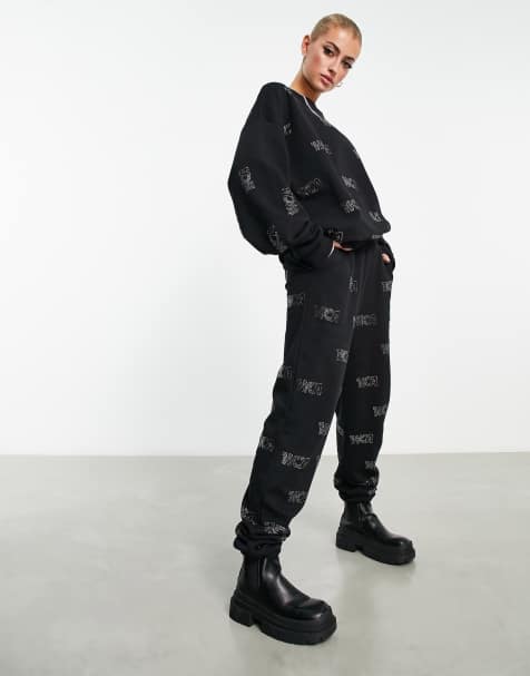 ASOS Weekend Collective sweatpants with hotfix monogram in black - view 1