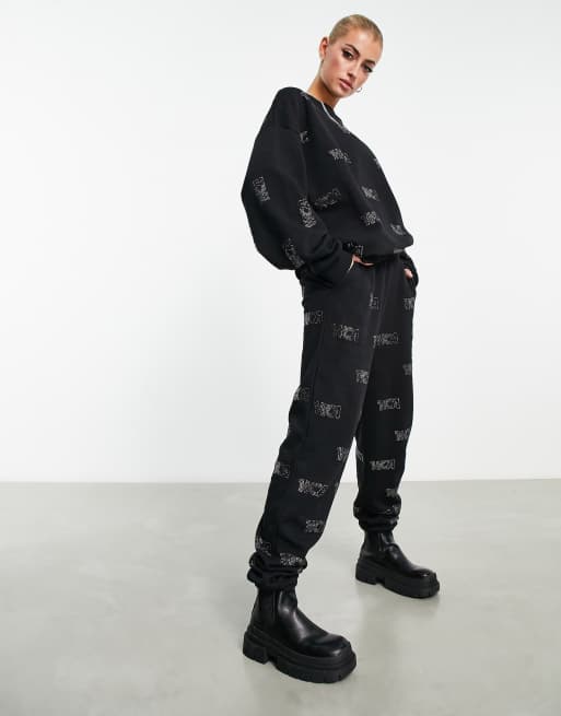 ASOS Weekend Collective sweatpants with hotfix monogram in black