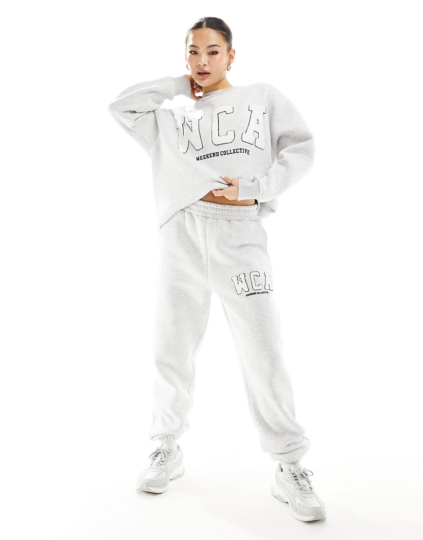 ASOS Weekend Collective sweatpants with varsity logo in gray heather