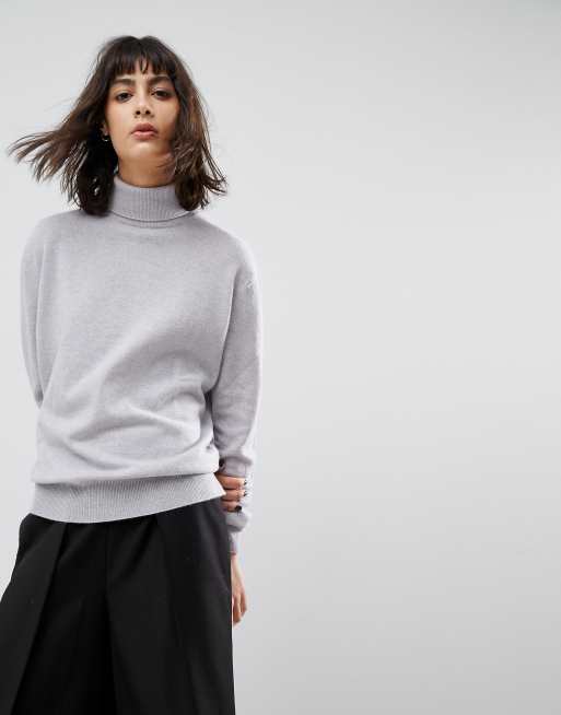 White cashmere clearance roll neck jumper