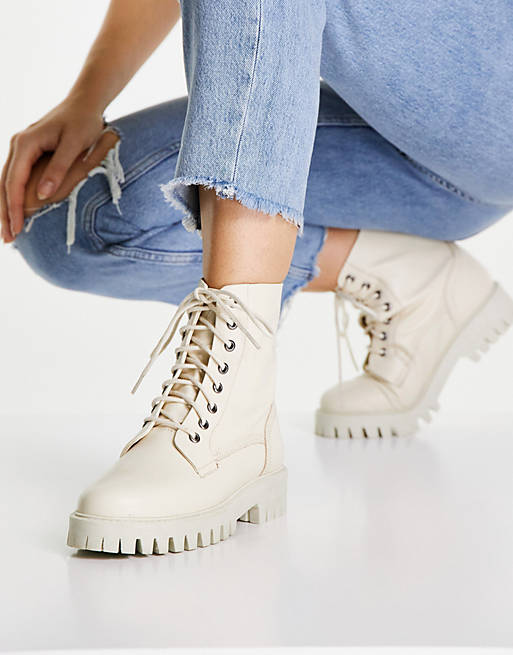 ASRA Billie lace up flat boots with stich detail in beige leather drench