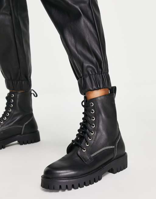 ASRA – Exclusive – Billie – Flache Schnürschuhe aus schwarzem Leder mit Ziernähten