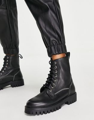 ASRA Exclusive Billie lace up flat boots with stitch detail in black leather