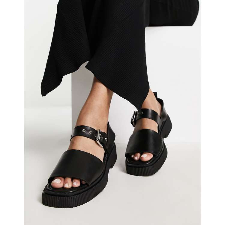 ASRA Exclusive Samba flat sandals with buckle strap in black